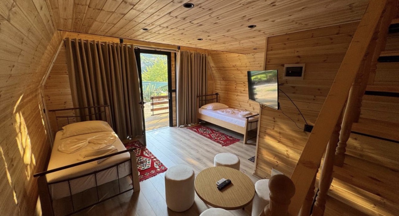 Warm timber interior of a Wooden Villa