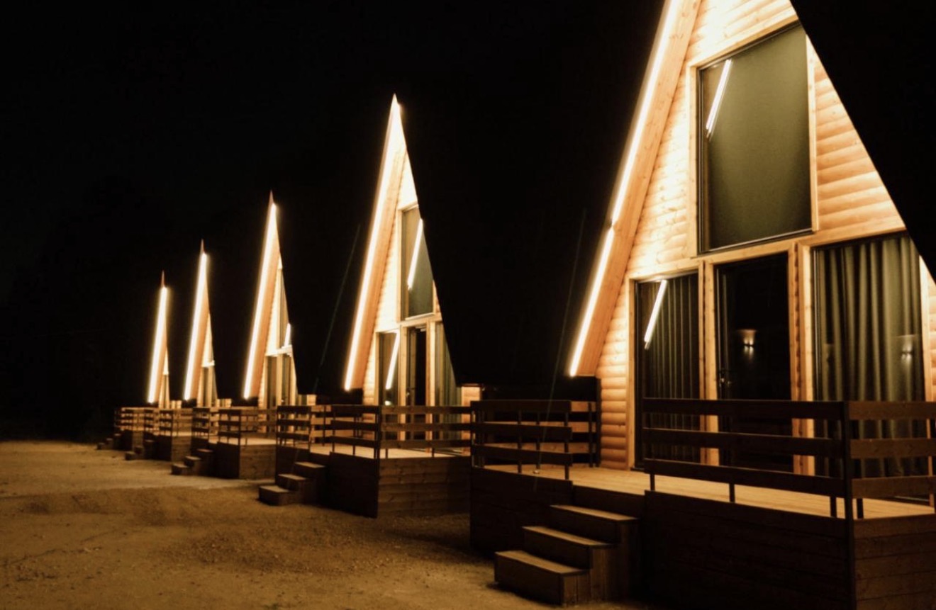 Wooden Villas illuminated at night