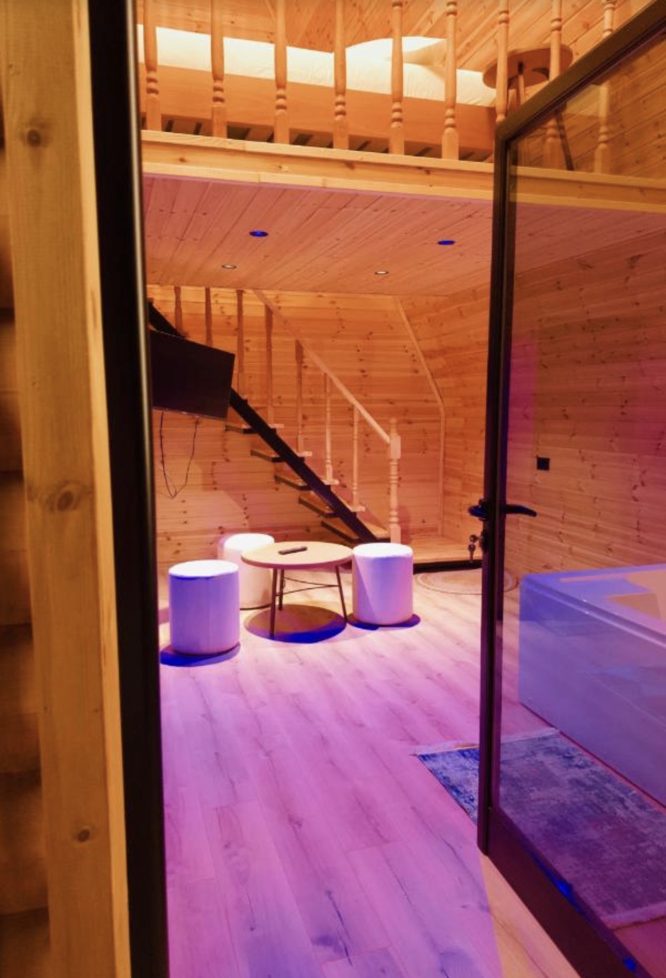 Warm lit Wooden Villa interior with jacuzzi